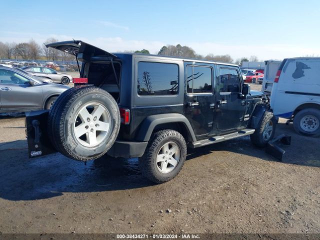 Photo 3 VIN: 1C4HJWDG4EL208608 - JEEP WRANGLER UNLIMITED 