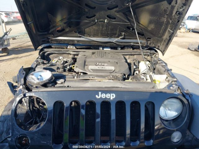 Photo 9 VIN: 1C4HJWDG4EL208608 - JEEP WRANGLER UNLIMITED 