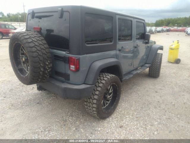 Photo 3 VIN: 1C4HJWDG4EL313942 - JEEP WRANGLER UNLIMITED 