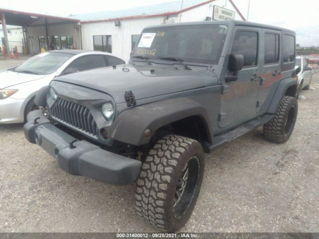 Photo 5 VIN: 1C4HJWDG4EL313942 - JEEP WRANGLER UNLIMITED 