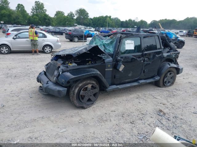 Photo 1 VIN: 1C4HJWDG4GL167707 - JEEP WRANGLER 