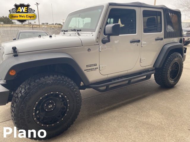 Photo 4 VIN: 1C4HJWDG4GL196009 - JEEP WRANGLER UNLIMITED 