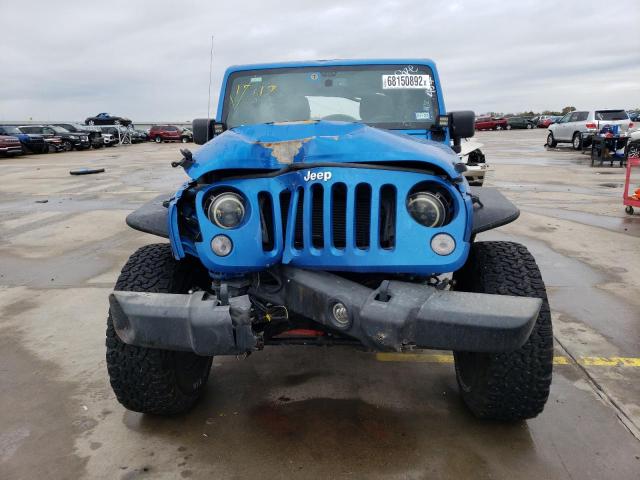 Photo 4 VIN: 1C4HJWDG5GL125854 - JEEP WRANGLER U 