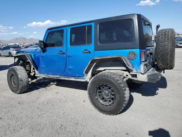 Photo 1 VIN: 1C4HJWDG5GL277889 - JEEP WRANGLER U 