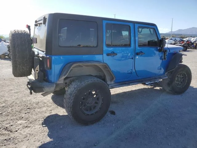 Photo 2 VIN: 1C4HJWDG5GL277889 - JEEP WRANGLER U 