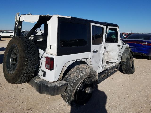 Photo 3 VIN: 1C4HJWDG5HL677307 - JEEP WRANGLER U 