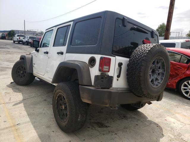 Photo 2 VIN: 1C4HJWDG7CL218675 - JEEP WRANGLER U 