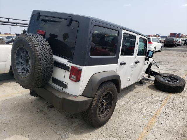 Photo 3 VIN: 1C4HJWDG7CL218675 - JEEP WRANGLER U 