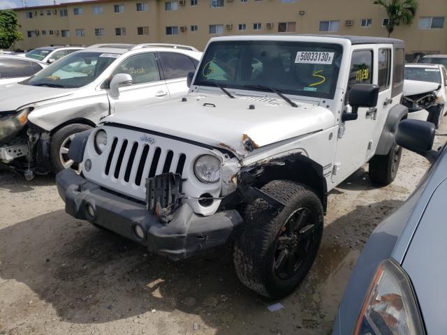 Photo 1 VIN: 1C4HJWDG7EL288891 - JEEP WRANGLER U 