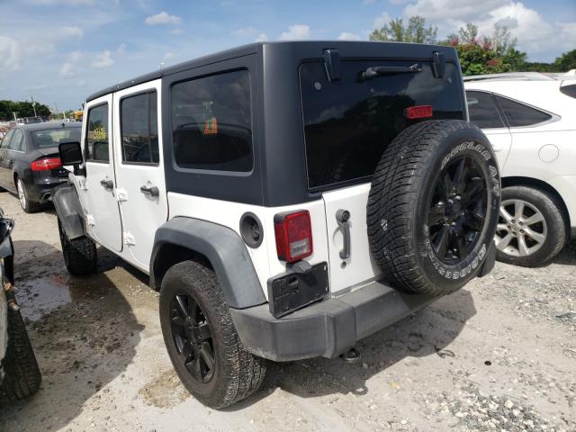 Photo 2 VIN: 1C4HJWDG7EL288891 - JEEP WRANGLER U 