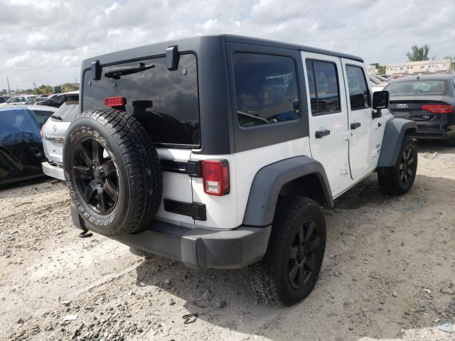 Photo 3 VIN: 1C4HJWDG7EL288891 - JEEP WRANGLER U 