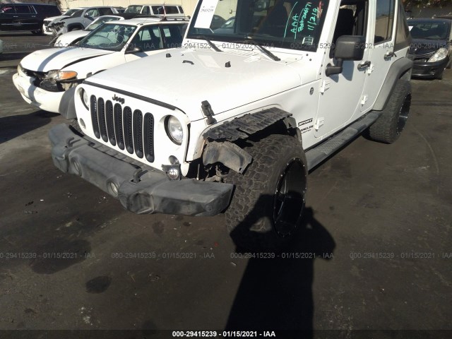 Photo 5 VIN: 1C4HJWDG9EL235366 - JEEP WRANGLER UNLIMITED 