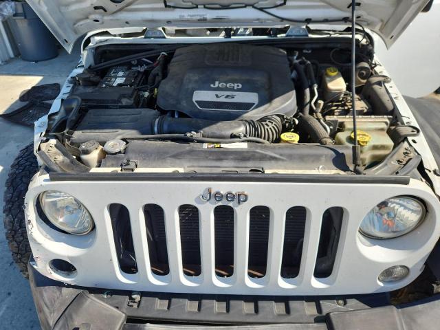 Photo 11 VIN: 1C4HJWDG9GL205111 - JEEP WRANGLER U 