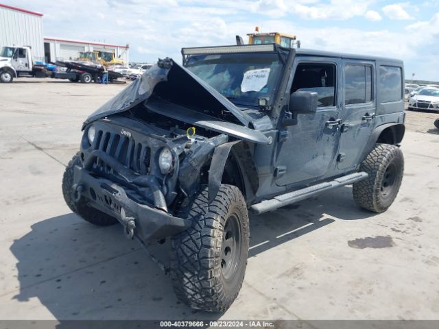 Photo 1 VIN: 1C4HJWDG9GL230896 - JEEP WRANGLER 