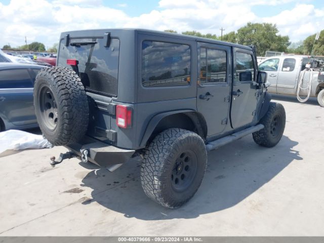 Photo 3 VIN: 1C4HJWDG9GL230896 - JEEP WRANGLER 