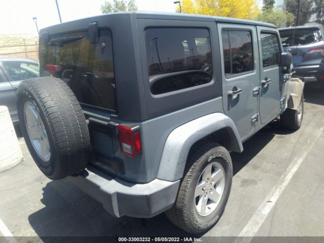 Photo 4 VIN: 1C4HJWDGXEL235571 - JEEP WRANGLER UNLIMITED 