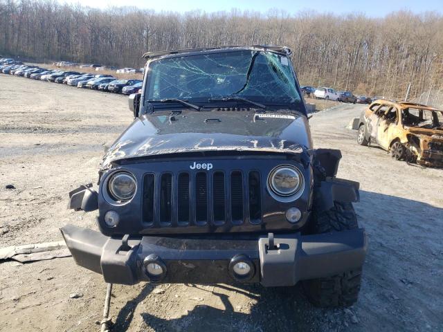 Photo 4 VIN: 1C4HJWEG4GL307687 - JEEP WRANGLER U 