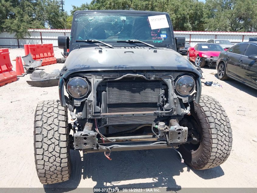 Photo 12 VIN: 1C4HJWEG7EL307342 - JEEP WRANGLER 