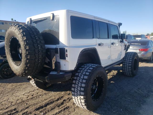 Photo 3 VIN: 1C4HJWEG8GL149130 - JEEP WRANGLER UNLIMITED 