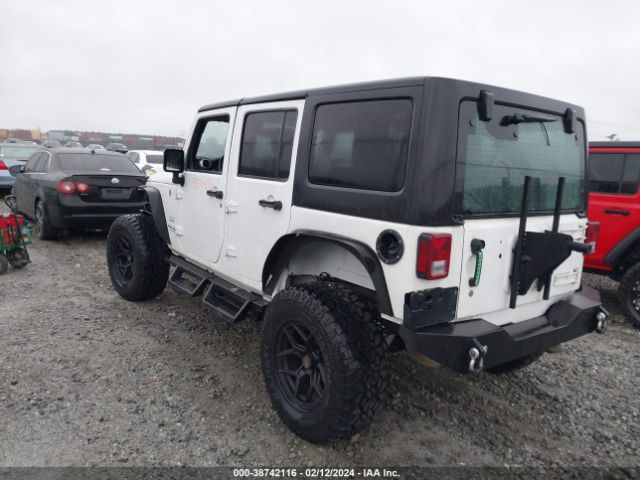 Photo 2 VIN: 1C4HJWEGXJL930349 - JEEP WRANGLER U 