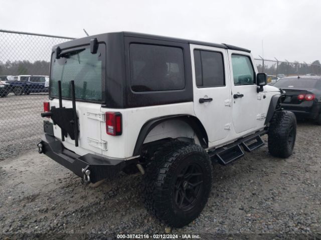 Photo 3 VIN: 1C4HJWEGXJL930349 - JEEP WRANGLER U 