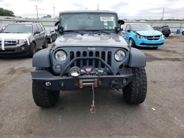 Photo 4 VIN: 1C4HJWFG2EL163617 - JEEP WRANGLER U 