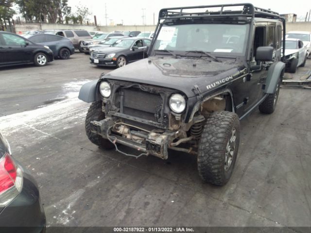 Photo 5 VIN: 1C4HJWFG3EL151282 - JEEP WRANGLER UNLIMITED 