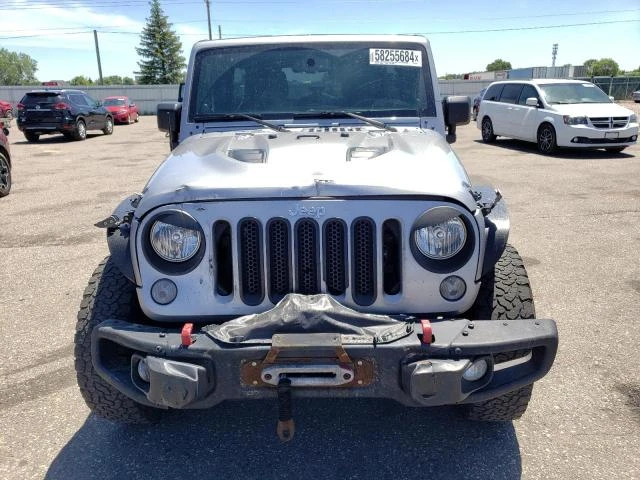 Photo 4 VIN: 1C4HJWFG5EL111334 - JEEP WRANGLER U 