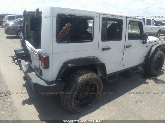 Photo 3 VIN: 1C4HJWFG5EL138906 - JEEP WRANGLER UNLIMITED 