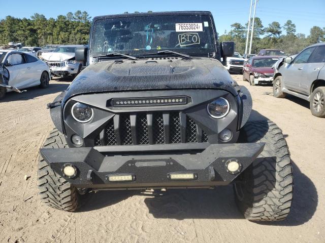 Photo 4 VIN: 1C4HJWFG6EL173941 - JEEP WRANGLER U 