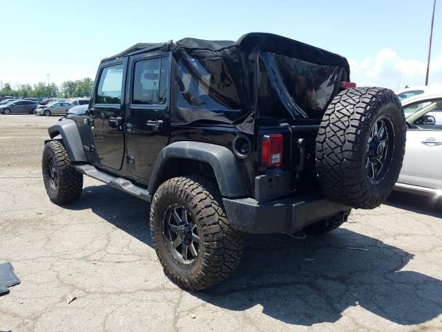 Photo 2 VIN: 1C4HJWFG6EL230798 - JEEP WRANGLER U 