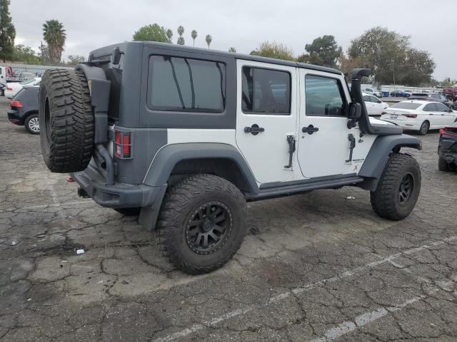 Photo 2 VIN: 1C4HJWFG7EL234360 - JEEP WRANGLER U 