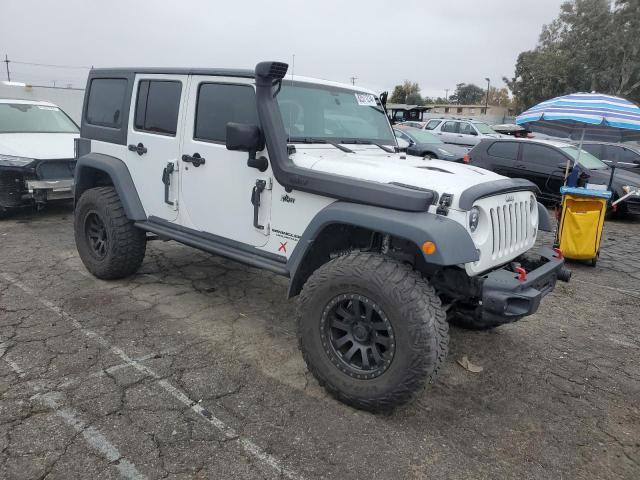 Photo 3 VIN: 1C4HJWFG7EL234360 - JEEP WRANGLER U 