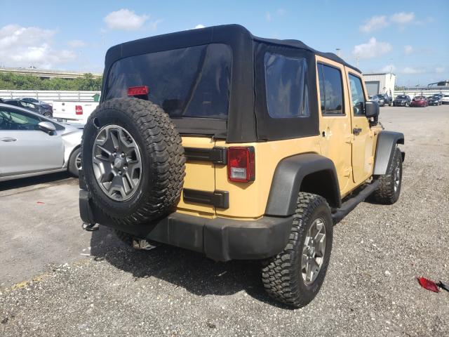 Photo 3 VIN: 1C4HJWFG9EL150394 - JEEP WRANGLER UNLIMITED 