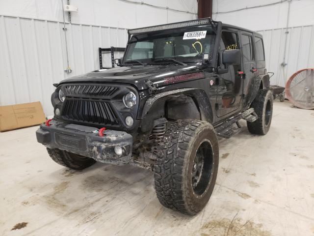 Photo 1 VIN: 1C4HJWFG9EL160827 - JEEP WRANGLER U 