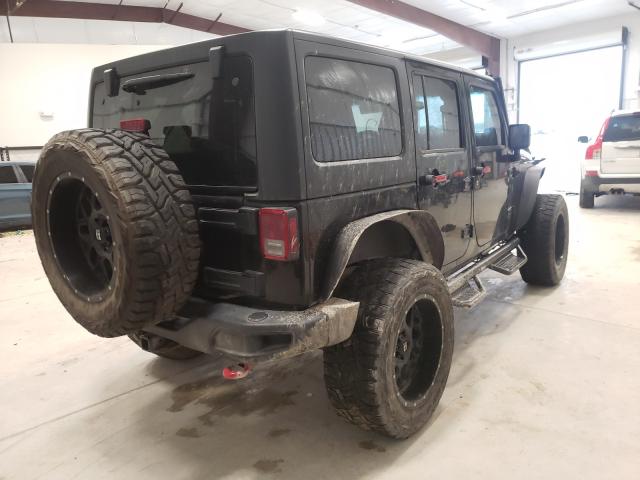 Photo 3 VIN: 1C4HJWFG9EL160827 - JEEP WRANGLER U 