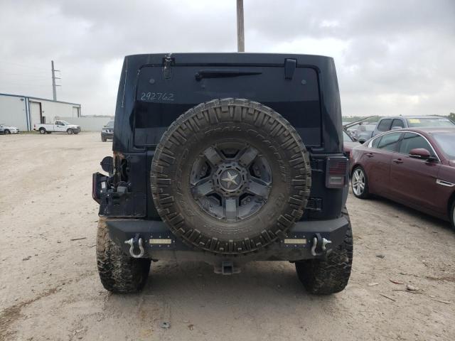 Photo 5 VIN: 1C4HJWFG9EL292762 - JEEP WRANGLER U 