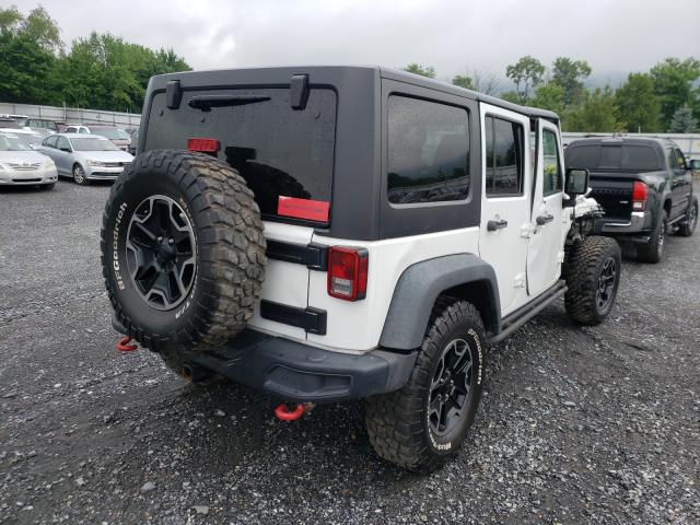 Photo 3 VIN: 1C4HJWFG9GL134909 - JEEP WRANGLER U 