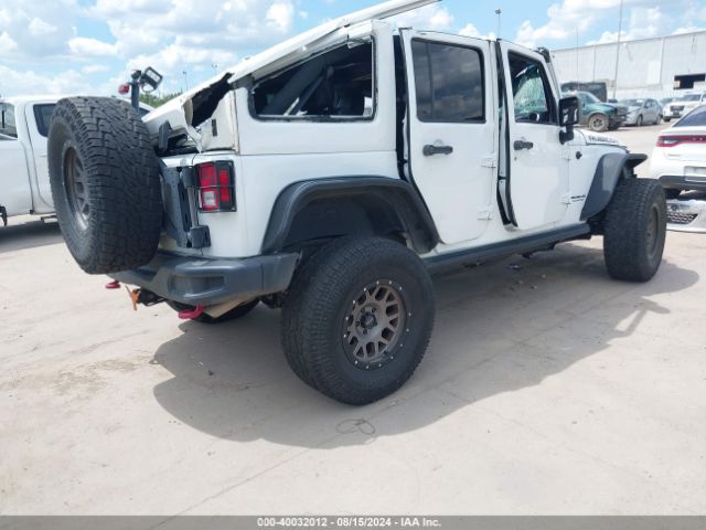 Photo 3 VIN: 1C4HJWFG9GL152388 - JEEP WRANGLER 