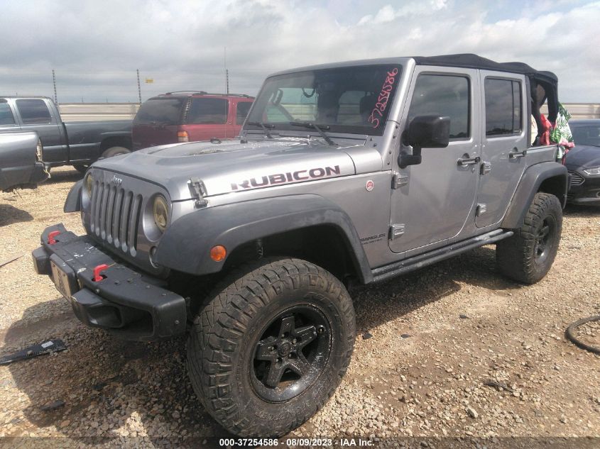 Photo 1 VIN: 1C4HJWFG9GL331496 - JEEP WRANGLER 