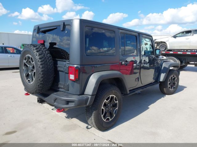 Photo 3 VIN: 1C4HJWFGXGL274936 - JEEP WRANGLER 