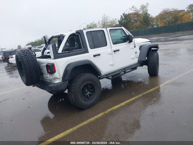 Photo 3 VIN: 1C4HJXDG1JW259532 - JEEP WRANGLER UNLIMITED 