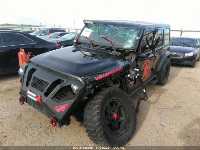 Photo 5 VIN: 1C4HJXDG2JW143935 - JEEP WRANGLER UNLIMITED 