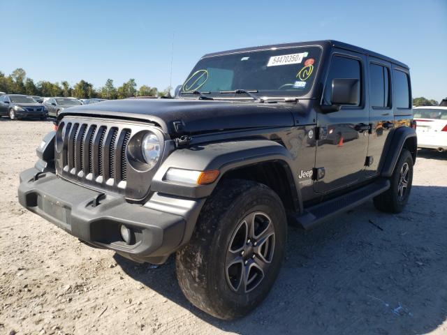 Photo 1 VIN: 1C4HJXDG4KW511162 - JEEP WRANGLER U 