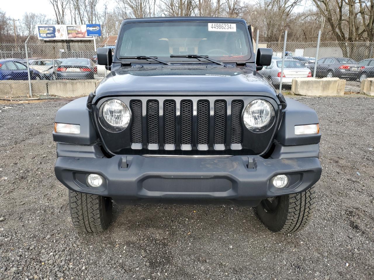 Photo 4 VIN: 1C4HJXDM1PW577617 - JEEP WRANGLER 