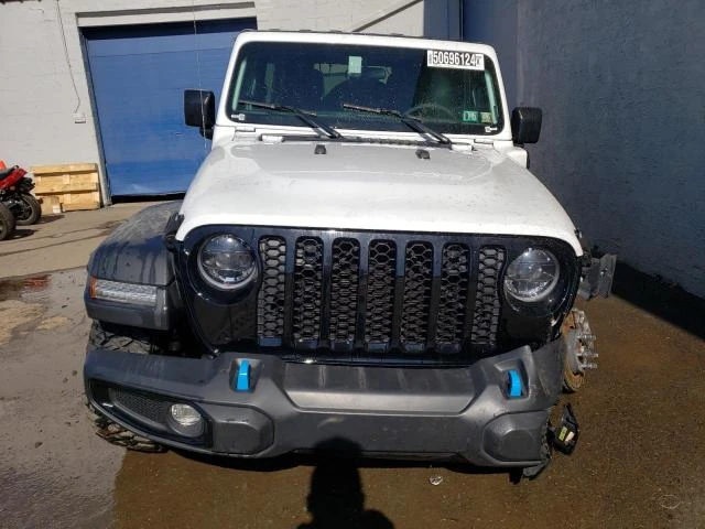 Photo 4 VIN: 1C4JJXN61PW702794 - JEEP WRANGLER 4 