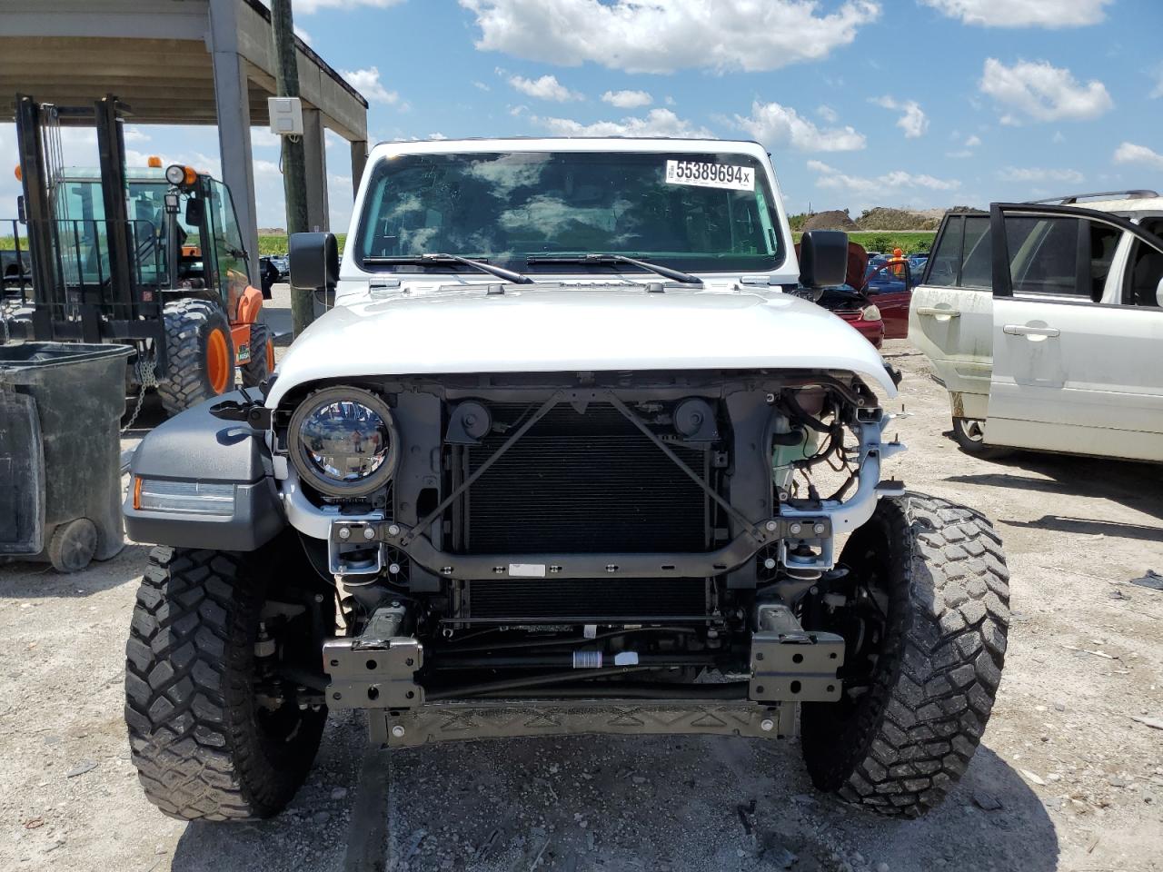 Photo 4 VIN: 1C4JJXN66PW690495 - JEEP WRANGLER 