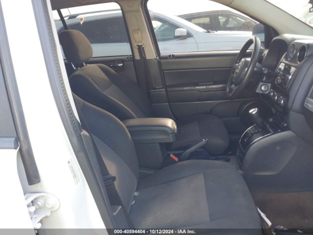 Photo 4 VIN: 1C4NJCBA0GD568097 - JEEP COMPASS 