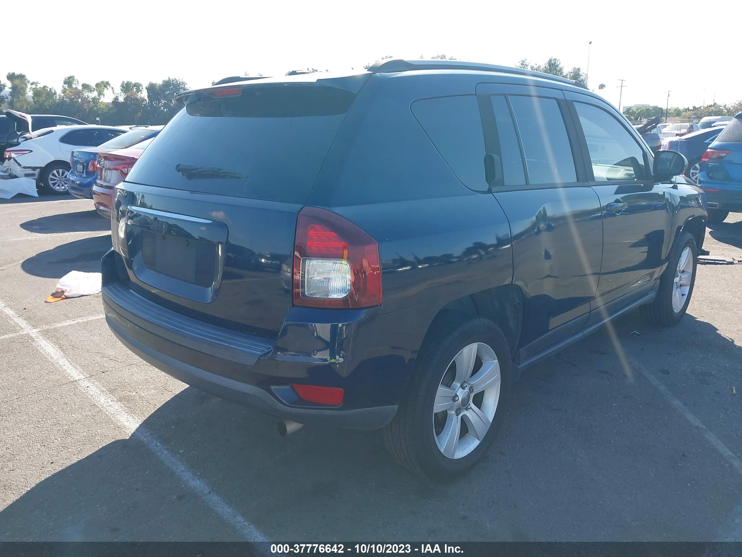 Photo 3 VIN: 1C4NJCBA3GD742745 - JEEP COMPASS 