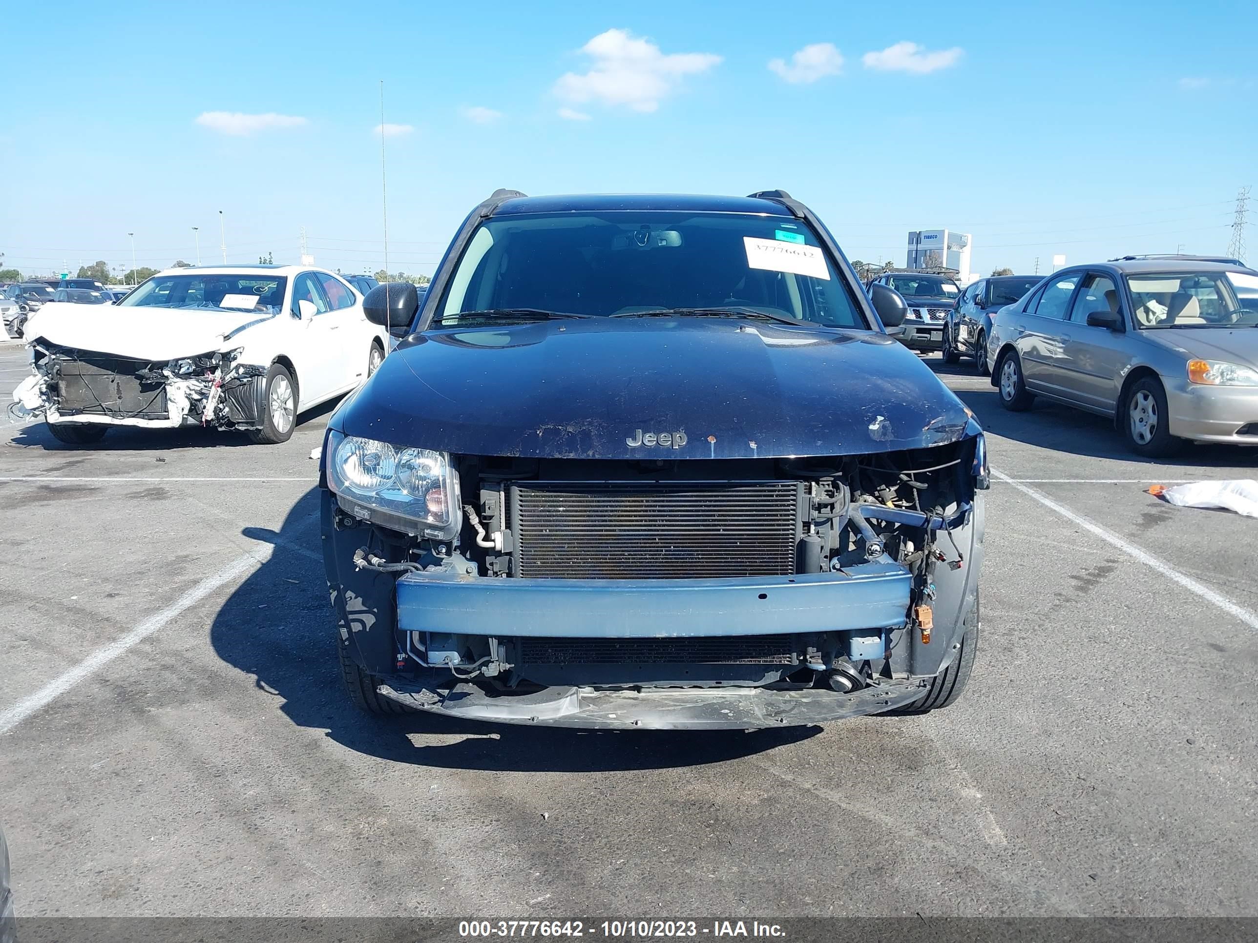 Photo 5 VIN: 1C4NJCBA3GD742745 - JEEP COMPASS 